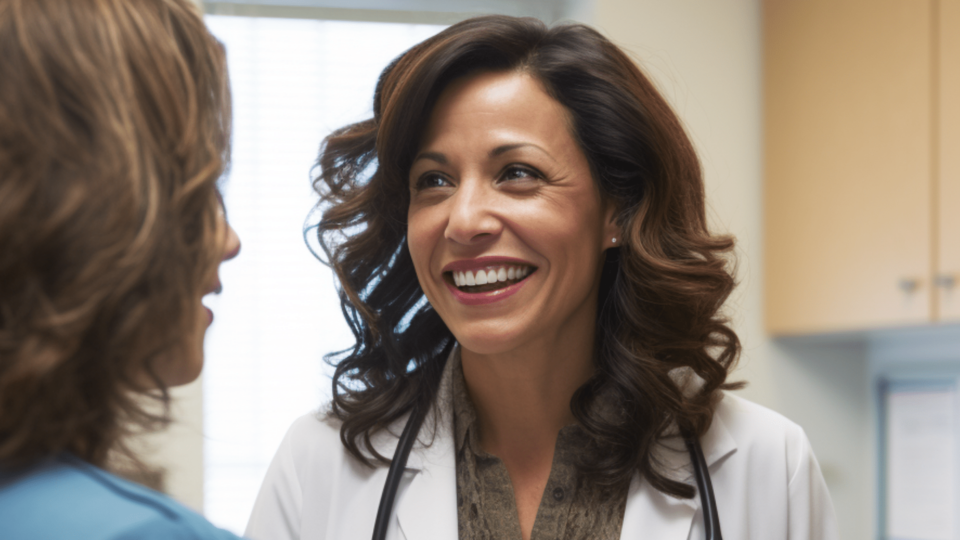 a doctor happily talking with her patient