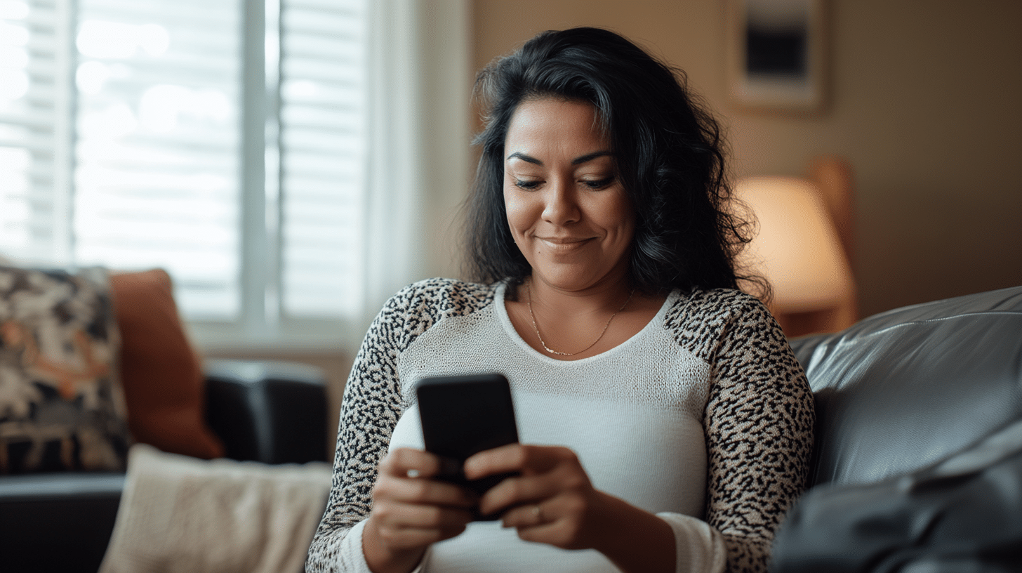 A woman looking at her phone that indicates tracking her progress in food tracking.